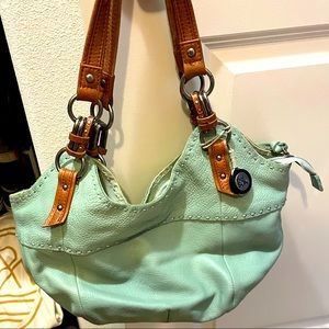 Light blue handbag by The Sak. Gently used, good condition.